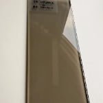 Bronze textured glass surface with translucent finish