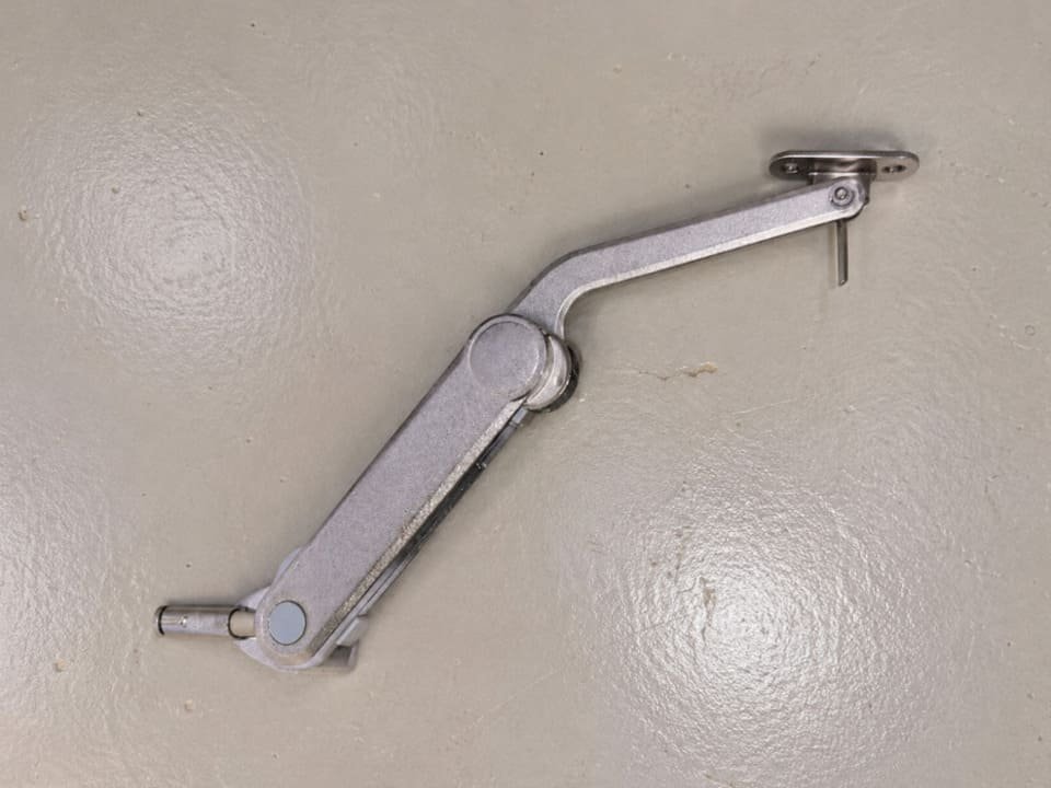 Free-stop door stay for lift-up cabinet door support