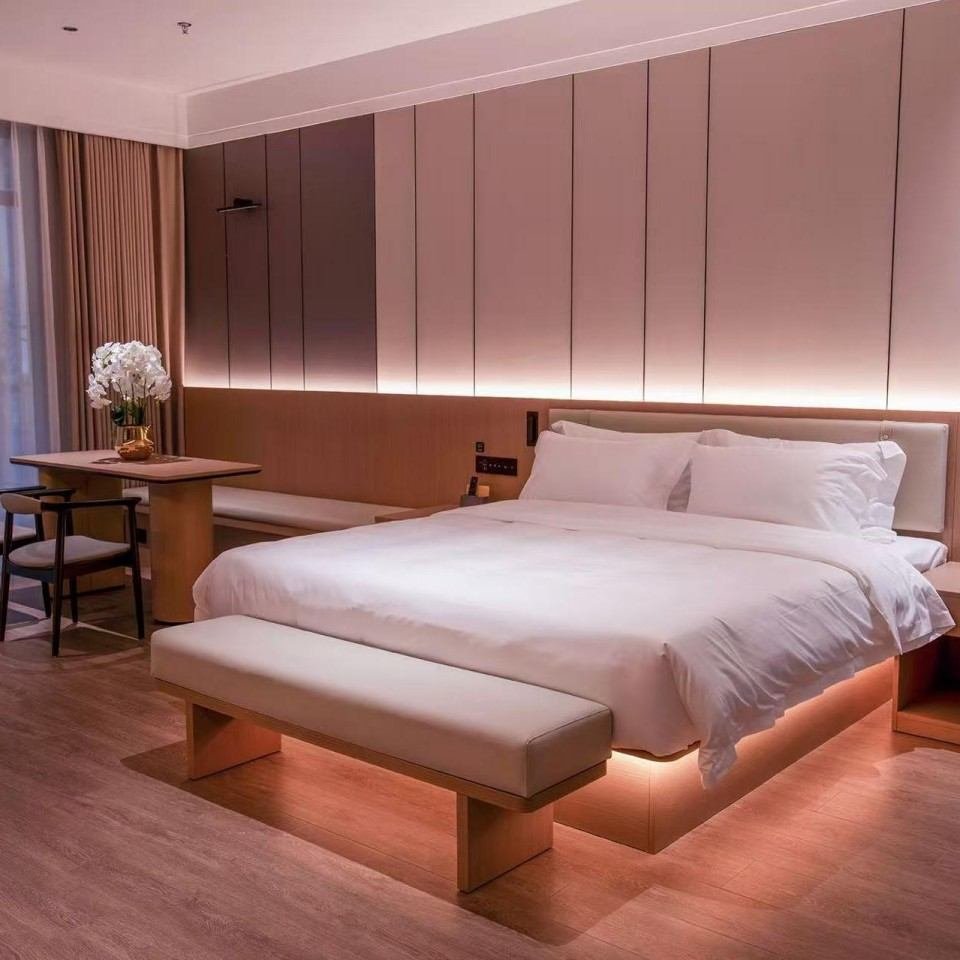 Banshan Hotel guest room with custom bedside wall panel