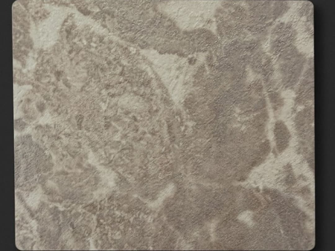 High-pressure laminate sample with stone-look textured surface