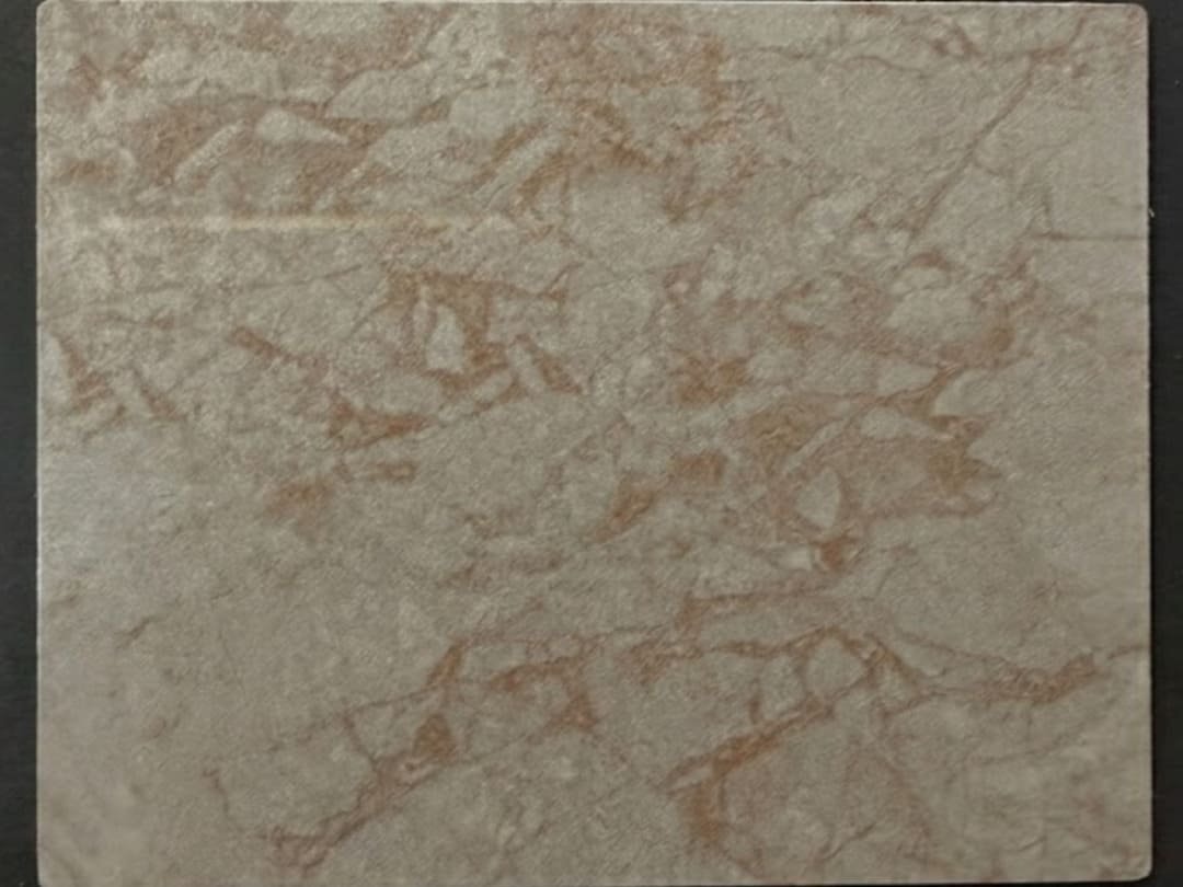 High-pressure laminate sample with beige stone-look textured surface