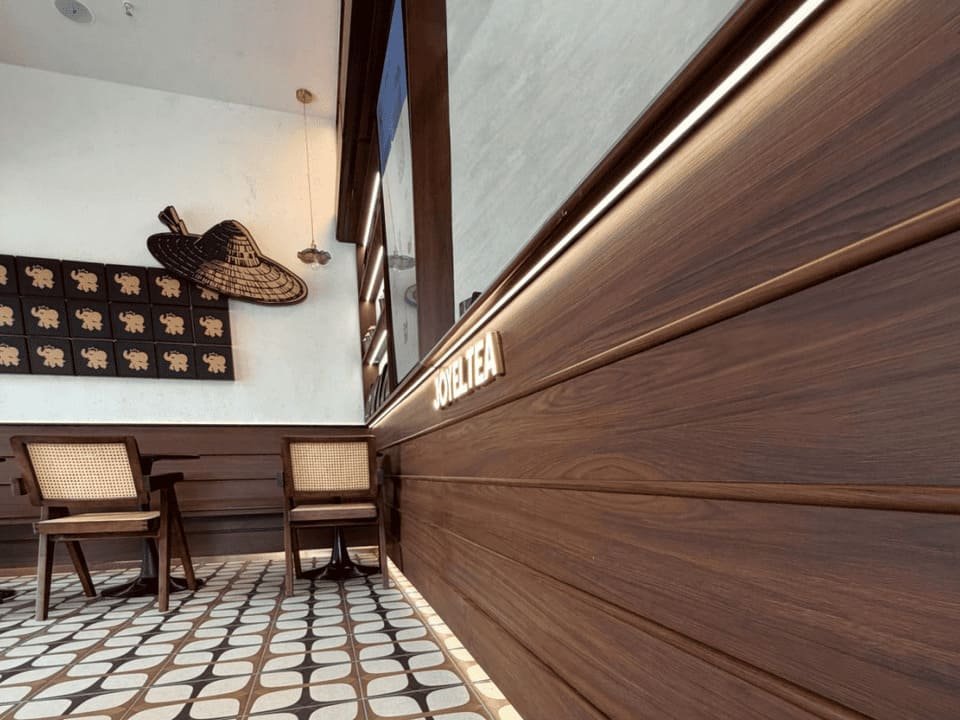 Warm LED strip lighting used along wood wall panels