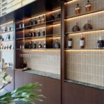 Warm LED strip lighting used in bar display shelves