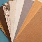 Melamine finish samples with wood grain and solid color surfaces
