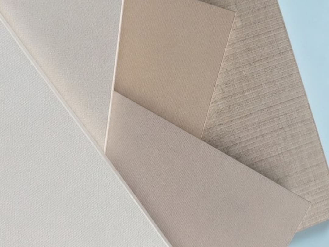 Melamine finish samples with light fabric-like textured surfaces