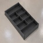 Pull-out storage basket with divided compartments for cabinet organization