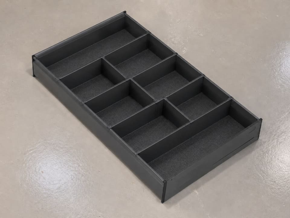 Pull-out storage basket with divided compartments for cabinet organization
