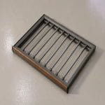 Pull-out trouser rack for wardrobe storage