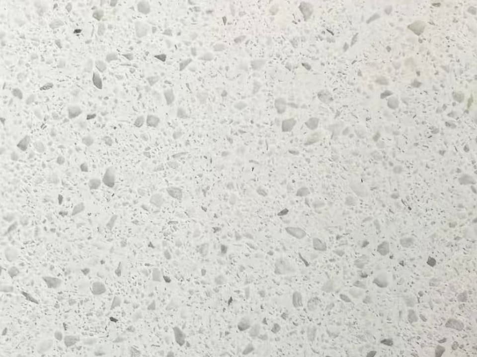 Quartz stone surface with light grey aggregate texture