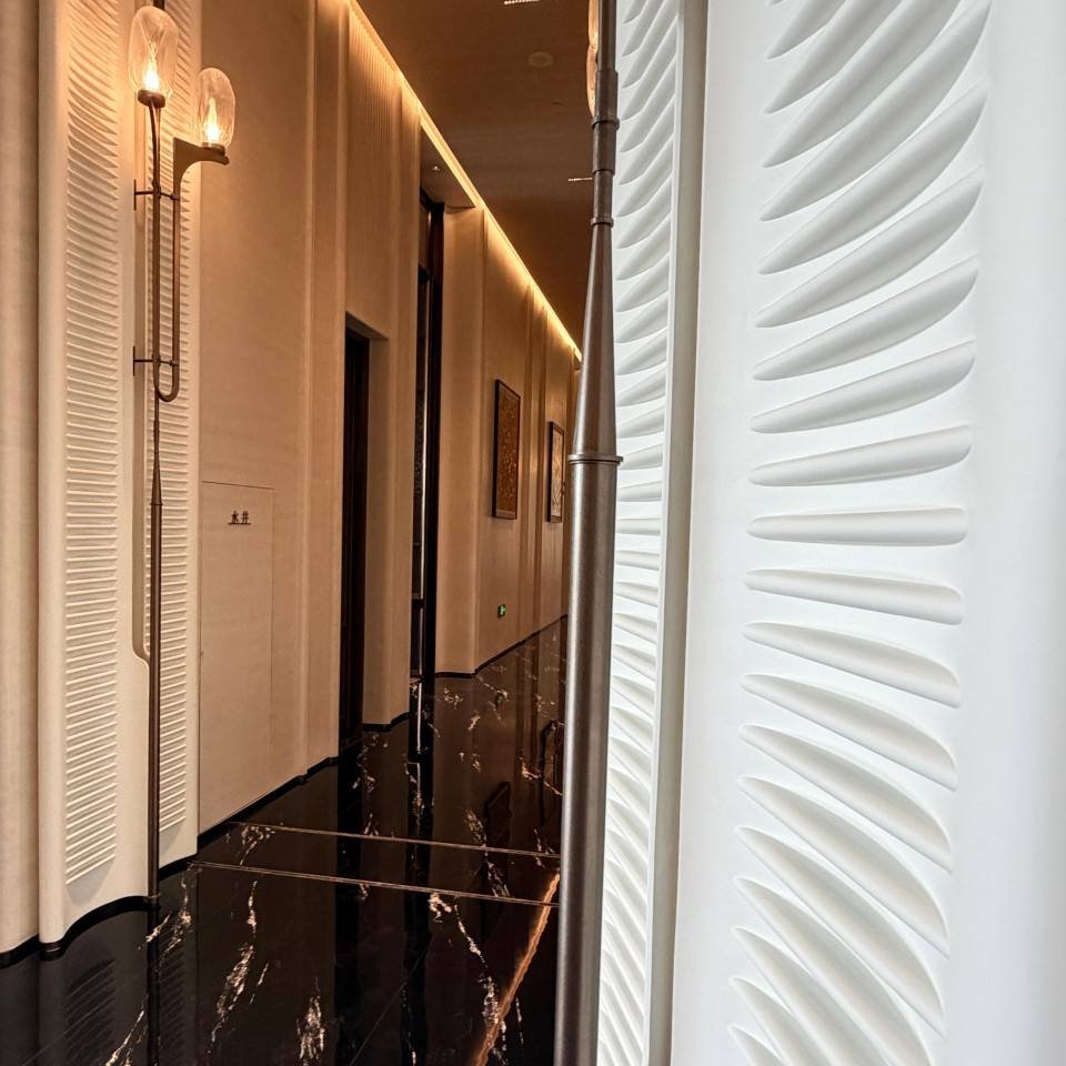 Lantingxu Sales Center screen partition scene with textured wall panel and wall lighting