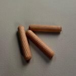 Wooden dowels for cabinet panel connection