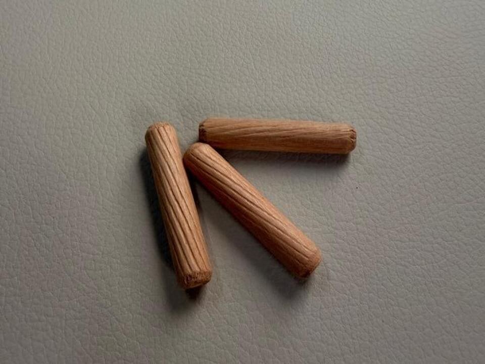 Wooden dowels for cabinet panel connection