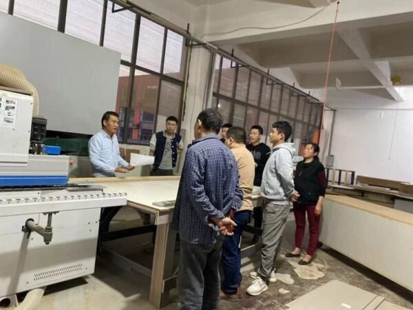 Horace Home team reviewing drawing details in the workshop
