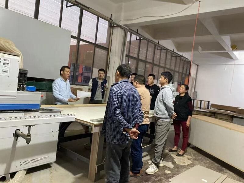 Horace Home team reviewing drawing details in the workshop