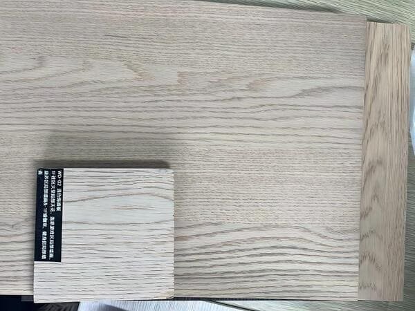 White oak veneer grain sample used to confirm the grain pattern and finished appearance before cabinet production.